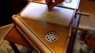 scrolling plucked psaltery