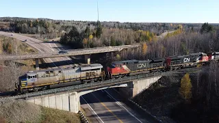 Nice Aerial Video - Ex CREX Gevo Leads a Big Manifest Train CN 305 w/DPU at Berry Mills, NB