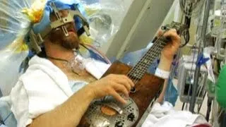 Man plays guitar during brain surgery