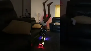 and 8-year-olds doing a handstand on a hoverboard