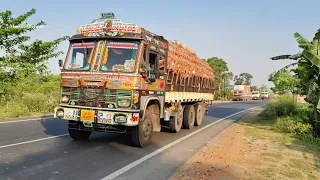 "Heavy Haul: Vegetable Oil Truck and Stone-loaded Dumper Conquer the Highway!"