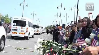 MH17: Sombre moment as hearses leave KLIA for burial