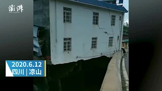 Hotel leans on bridge before it collapses since its foundation washed away by flood