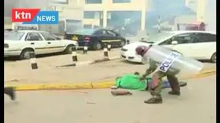 WARNING - GRAPHIC VIDEO: Police kicking fallen protester during anti-IEBC demonstration