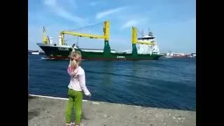 Girl honks at ship