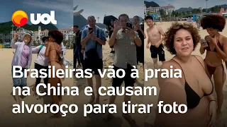 Brasileiras vão à praia na China e multidão causa alvoroço para tirar fotos; veja vídeos