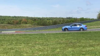 BMW M4 competition package going sideways at Monticello Motor Club