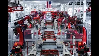 Роботы на фабрике Tesla