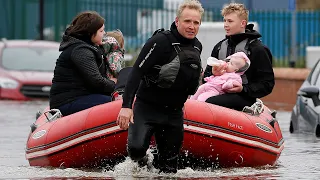 UK weather: 'Biblical' rain floods Yorkshire streets and rivers