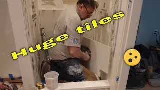 Huge tile on shower walls and floor, Complete install installation.