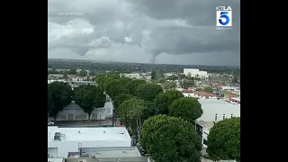 Tornado touches down east of downtown Los Angeles (viewer video)