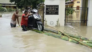 Scores dead in flooding and landslides in India and Nepal