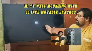 Mi 43 inch tv Wall mounting with movable bracket, movable bracket,tv fitting,tv,tv fitting near me,