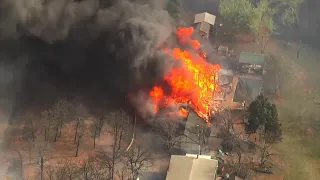 Sky 5 shows moments wildfire destroys home in Guthrie