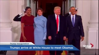 Barack and Michelle Obama welcome the Trumps to the White House