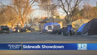 Sidewalk showdown underway between disabled community and city, county over homeless camps