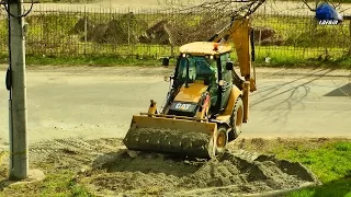 Buldoexcavator CAT 428F Working/Lucrand in Oradea - 07 April 2015