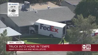 Fed-Ex truck strikes into Tempe home