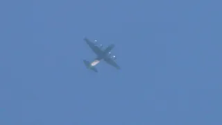 A Poland Airforce C-130E Hercules with 4-blade props flying overhead over my house at 23.000 ft!