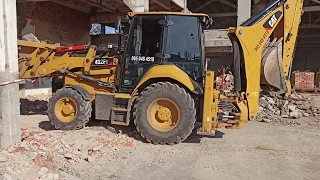 CAT 432F2 вывоз бетонного и кирпичного боя