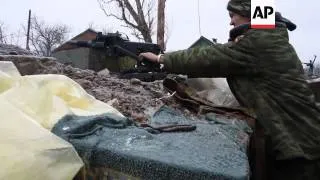 Pro-Russian rebels fight on frontline near Checkpoint 31