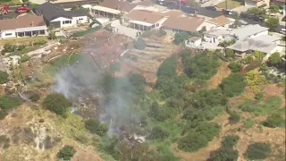 Raw Video: Brush Fire Threatens Homes