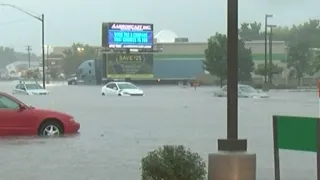 Cars Stuck In Water On Flooded Main Street