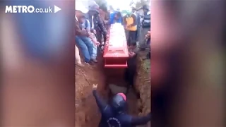 Woman's body falls out of coffin during funeral after pallbearer falls on top