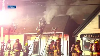 Raw scene video: Firefighters battle blaze on Main Street in Plymouth