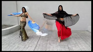 Danza con abanicos de seda y velos 🦋