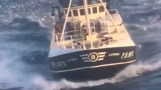 ship in storm - fishing trawler rough sea