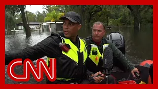 Don Lemon tours neighborhood underwater. Hear why residents didn't leave before storm