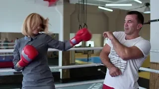 Beautiful Woman in Elegant Dress Training with Coach at Boxing Ring | Stock Footage - Videohive