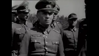 Field Marshal Erwin Rommel  inspects a new type of mobile rocket launcher in Normandy, May 1944