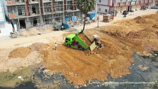 Incredible Power Komatsu D20P Bulldozer Pushing Soil And Mini Dump Trucks Unloading Soil