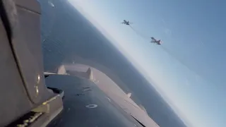 Two Russian Su-24s escorted by a Belgian F-16AM