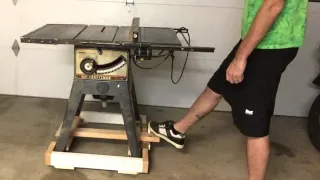 Retractable caster base for a table saw