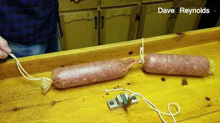 Tying Homemade Italian Salami In Basement