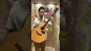 Marcin playing guitar in a messy elevator (Clip)