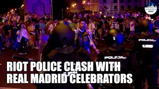 Hundreds clash with Spanish riot police after Real Madrid winning Champions League