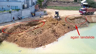 Landslide again and again make the work take longer and repaired by bulldozer with 10 wheel trucks