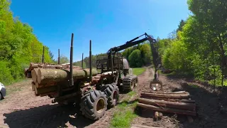 John Deere 1210e na gąsienicach i nowych oponach.