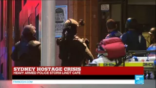 Police storm Sydney café to end hostage crisis - AUSTRALIA