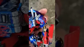 Studio Series 05 optimus prime Baiwei 6022 met version custom painted with dent marks (silver paint)