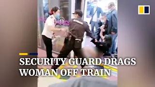 Security guard drags woman off train, sparking outrage in China