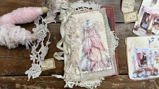 A Shabby Chic junk journal cover made out of a vintage book cover, The Dress Maker book.