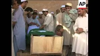 Aftermath of suicide bomb attack at Afghan border, funerals of victims