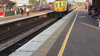 Trains at Wigan northwestern on 19th April 2019 night time