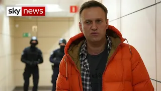 Putin critic Alexei Navalny fights for his life following suspected poisoning