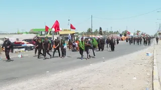 Shiite pilgrims walk from Baghdad to Karbala in pilgrimage of Arbaeen